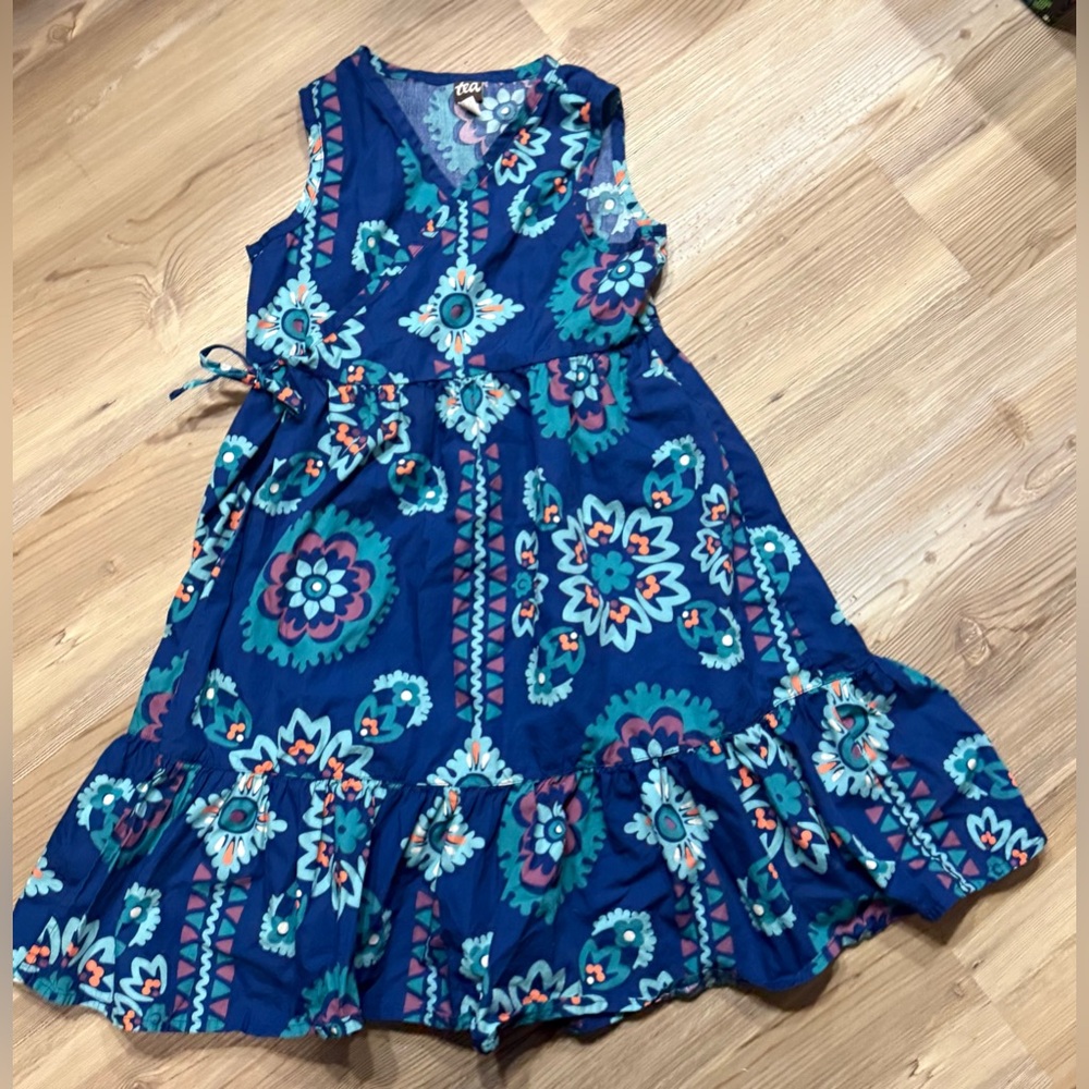 Tea Collection Sleeveless Wrap Dress in the "Limpopo Bandana" print.